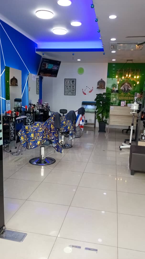 THE MENS ROOM BARBER SHOP